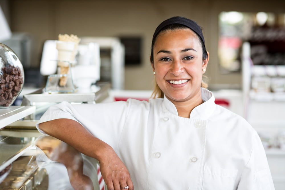 portrait of hispanic woman owner of a candy shop 2022 03 04 02 13 15 utc