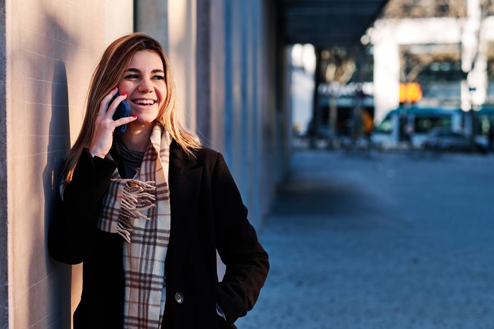 woman talking on the phone outdoors 2022 10 11 19 59 44 utc