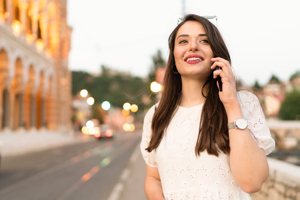 young-charming-woman-talking-on-the-phone-2022-01-18-23-34-33-utc young charming woman talking on the phone 2022 01 18 23 34 33 utc
